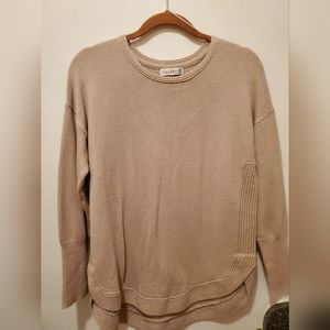 Cream high low sweater, back has flecks of gold thread